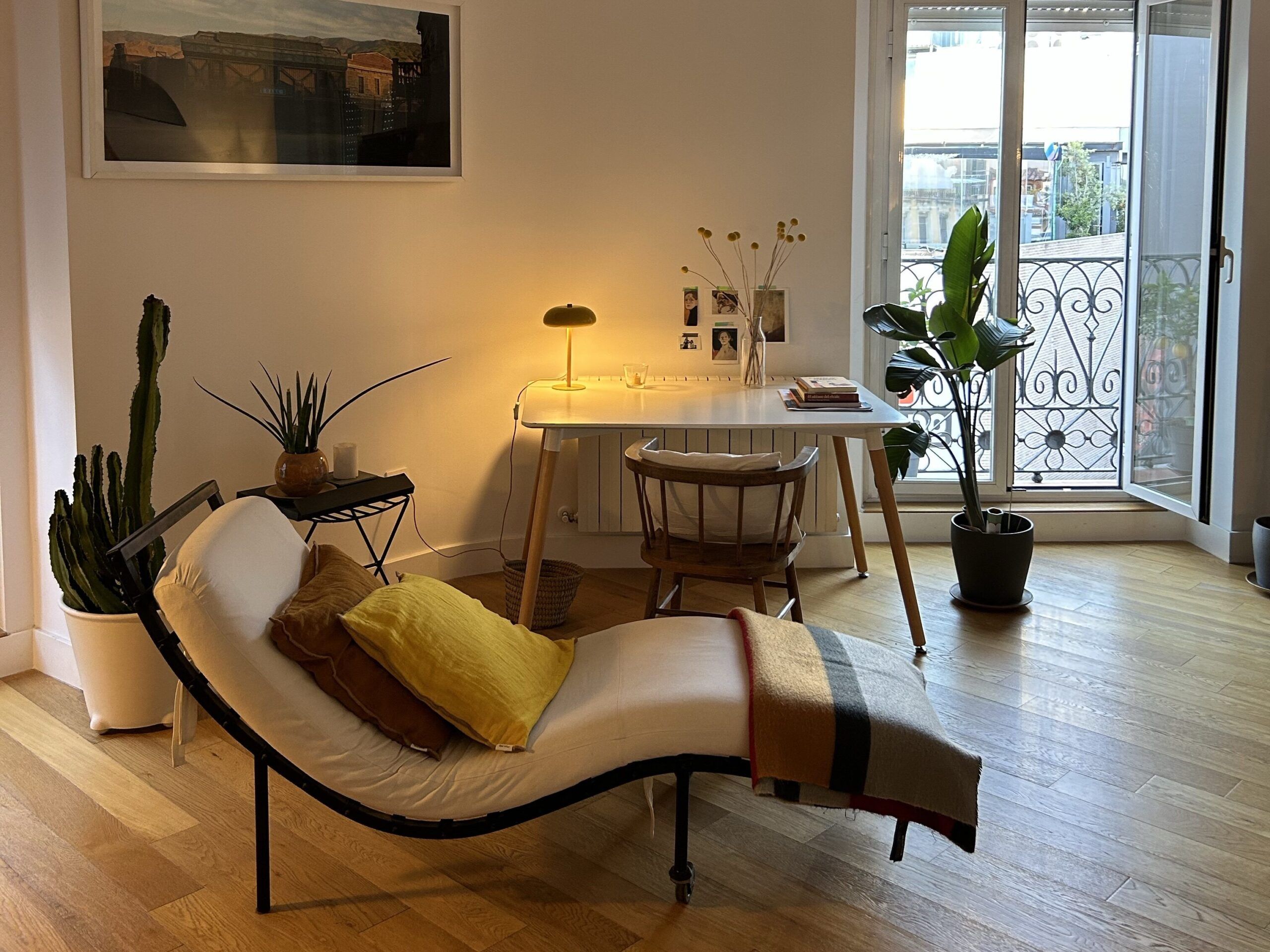 Bright renovated living room in Valencia Spain with modern furniture, fresh paint and natural light