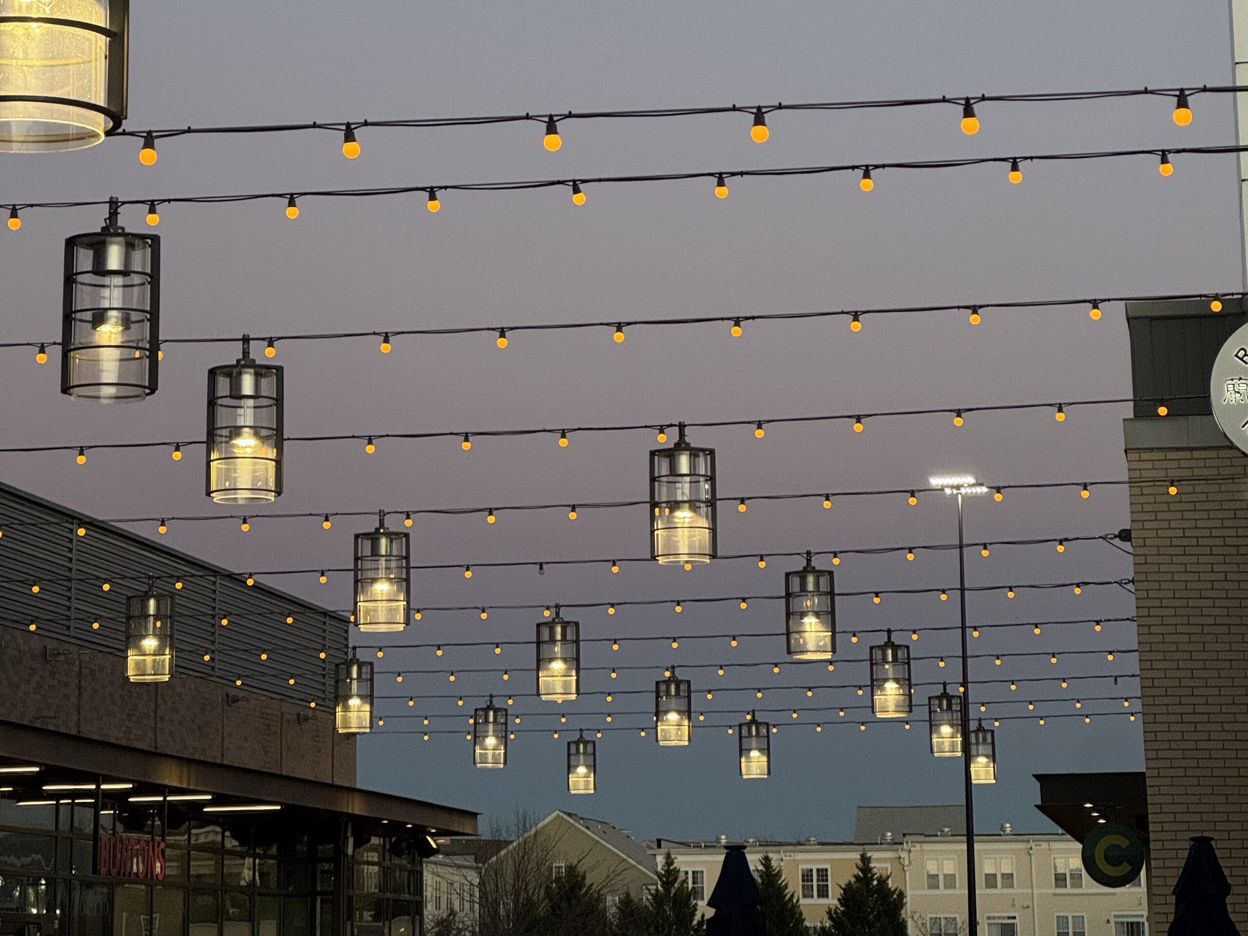 String lights and lanterns decorating the street during holiday season in Spain