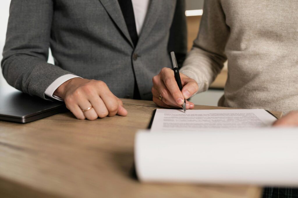 Expats in Spain signing property purchase contract before year-end