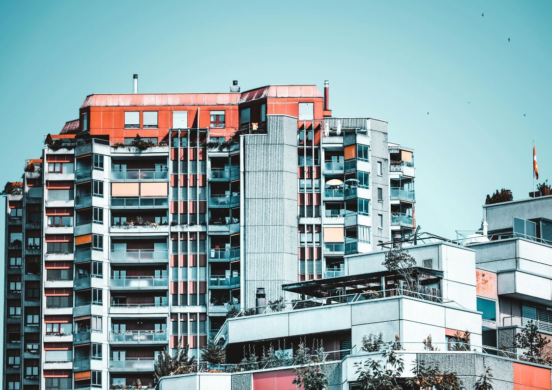 Modern apartment buildings in a Spanish city, representing Spain’s vibrant real estate market.